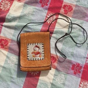 vintage baby donald duck tooled brown leather purse with braided strap